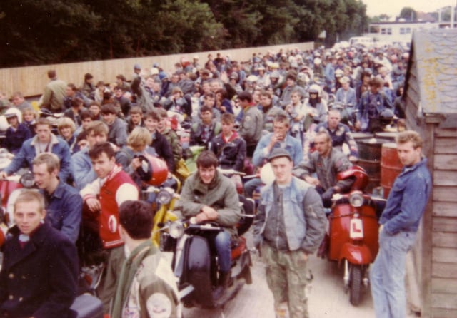 Scooterists waiting for the ferry after the Isle of Wight scooter rally in August 1983