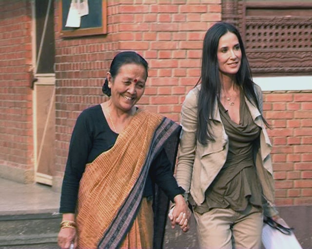 Moore with Anuradha Koirala during a visit to Nepal in 2011
