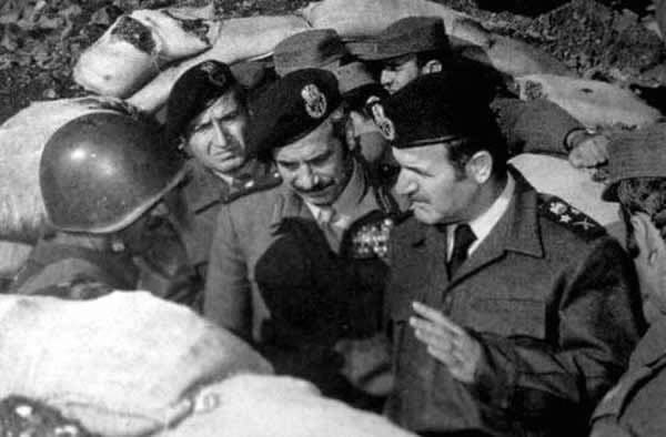 President Hafez al-Assad (right) with soldiers, 1973