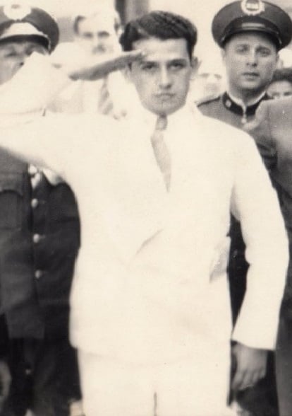 Eliás Beauchamp gives a cadet military salute, moments before being executed at police headquarters
