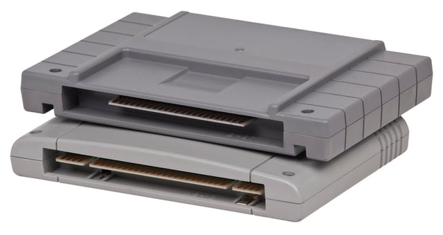 A cartridge shape comparisonTop: North American designBottom: Japanese and PAL region design. The bottom cartridge also illustrates the optional pins used by enhancement chips such as the Super FX 3D chip.