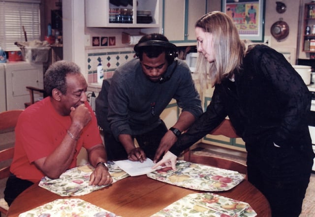 Cosby, a production assistant, and Ginna Marston of Partnership for Drug-Free Kids review the script for a 1990 public service spot at Cosby's studio in Astoria, Queens.