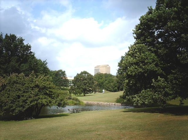 The University Park; rolling lawns, ponds and large oak trees