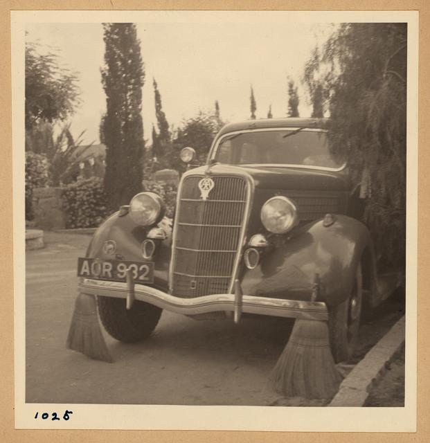 Arab strike 1936. Car with brooms to sweep away tacks thrown by strikers.