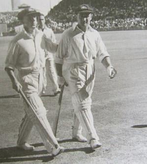 Don Bradman and Sid Barnes leave the field during their record stand of 405 in which they both made 234.