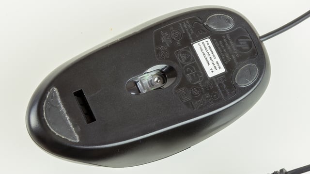 The underside of an optical mouse.