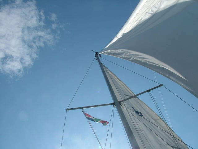 Sails on a small ship as seen from below