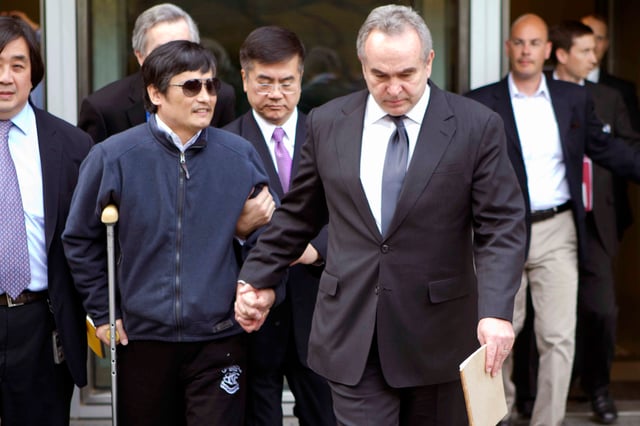 Civil rights activist Chen Guangcheng (left) with former United States ambassador to China Gary Locke (center) and former Assistant Secretary of State for East Asian and Pacific Affairs Kurt M. Campbell (right) at the U.S. Embassy in Beijing on 1 May 2012