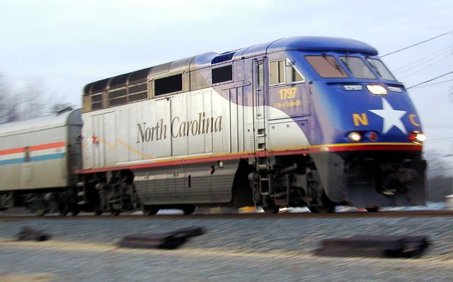 Amtrak's Piedmont near Charlotte, North Carolina with a state-owned locomotive. This route is run under a partnership with the North Carolina Department of Transportation, 2003