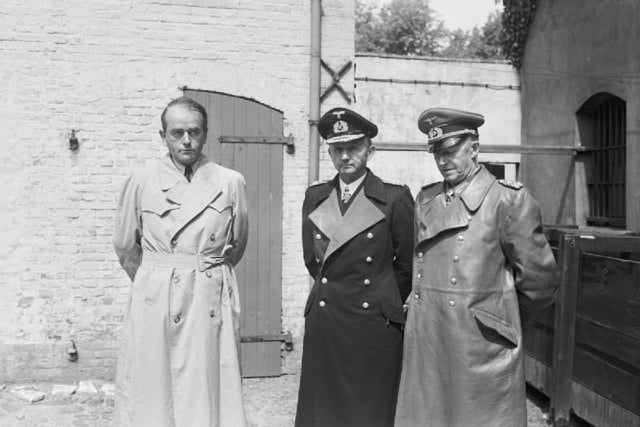 Albert Speer (left), Karl Dönitz (center) and Alfred Jodl (right) after their arrest.