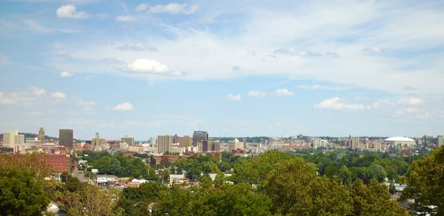 Skyline from northwest, showing downtown at left to Syracuse University's Carrier Dome at right