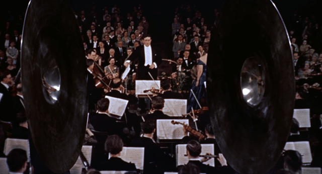 Bernard Herrmann conducting the orchestra in a scene from The Man Who Knew Too Much (1956)
