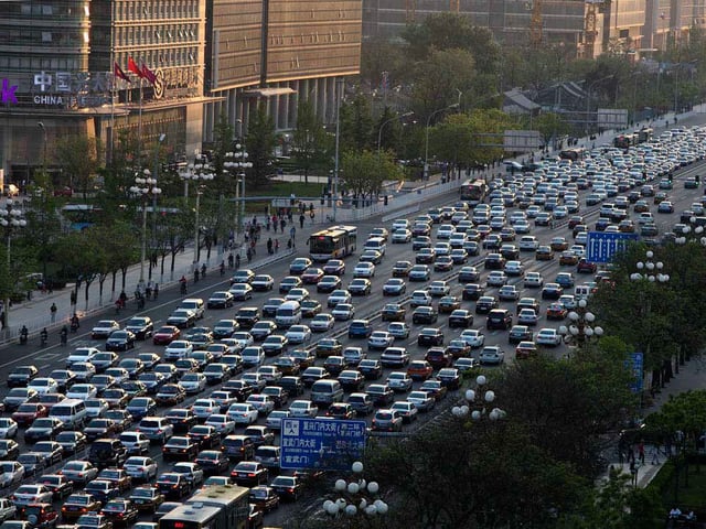 Road congestion is an issue in many major cities. (pictured is Chang'an Avenue in Beijing)