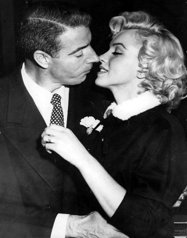 Joe DiMaggio and Monroe after getting married at San Francisco City Hall, January 1954
