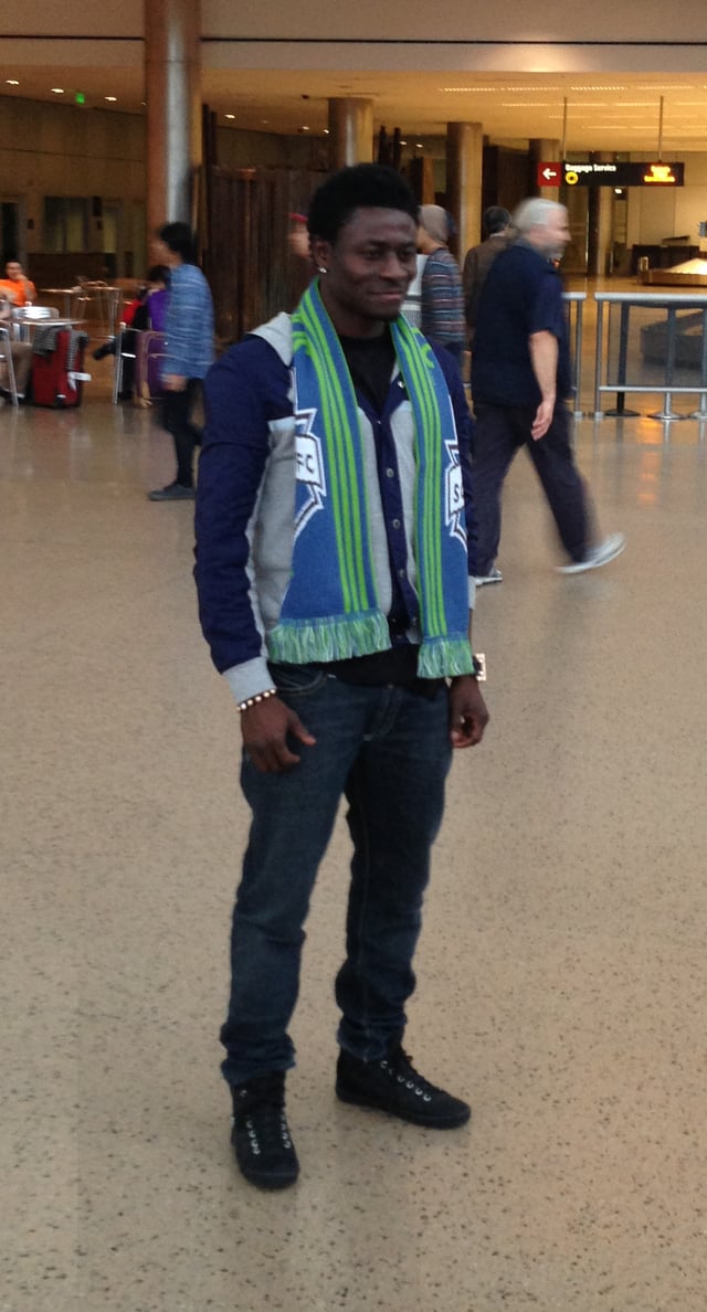 Martins at Seattle Tacoma International Airport upon arrival to Seattle Sounders FC in 2013