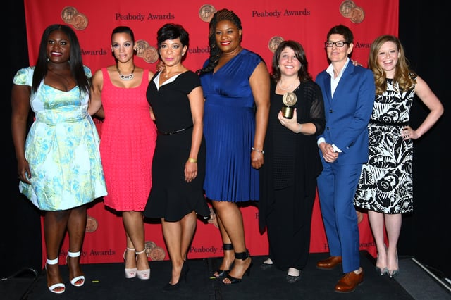 Members of the cast and crew with their Peabody Award, May 2014