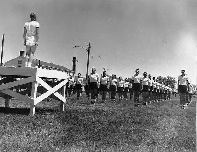 Cadets from the first USAFA class lined up for physical training at Lowry AFB in 1955