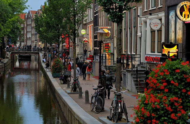 De Wallen, Amsterdam's Red-light district, offers activities such as legal prostitution and a number of coffee shops that sell cannabis. It is one of the main tourist attractions.