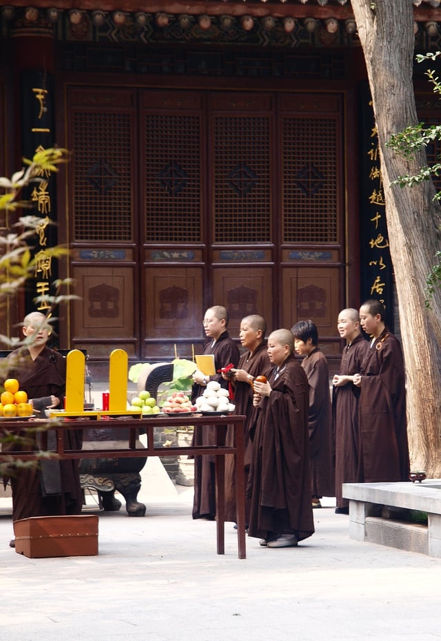 Chinese Buddhist nuns and laywomen at a temple in Xi'an.