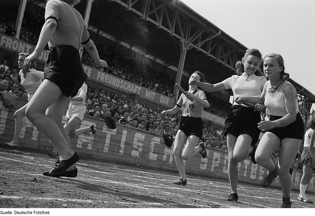 Girls handing over the baton in a relay race in Leipzig in 1950
