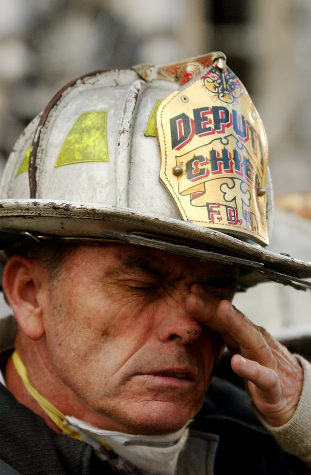 An FDNY deputy chief during rescue efforts at the World Trade Center following the September 11, 2001 attacks.