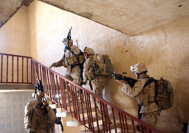 U.S. Marines from 3rd Battalion 3rd Marines clear a house in Al Anbar Governorate.