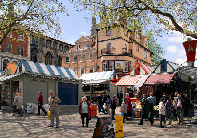 Norwich Market With St Peter Mancroft church and the Sir Garnet public house in the background.