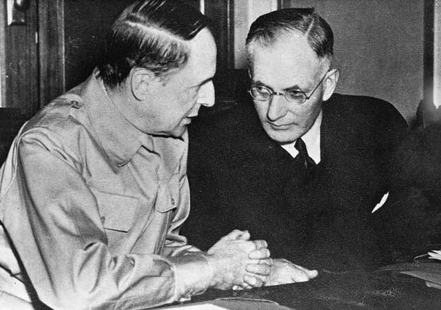 US General Douglas MacArthur, Commander of Allied forces in the South-West Pacific Area, with Australian Prime Minister John Curtin