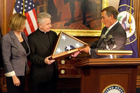 House Speaker John Boehner and Minority Leader Nancy Pelosi present a flag flown over the U.S. Capitol to Fr. Daniel Coughlin in recognition for his 11 years of service as Chaplain of the United States House of Representatives, April 2011
