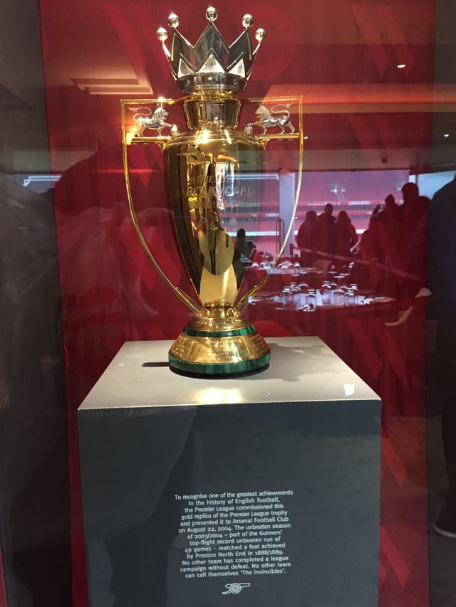 The gold Premier League trophy awarded to Arsenal for winning the 2003–04 title without defeat