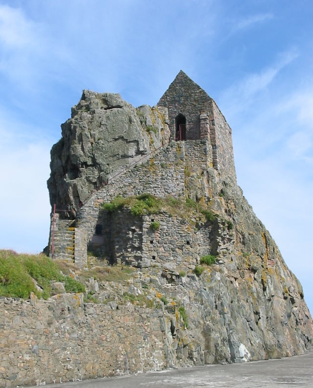 The Hermitage of St Helier lies in the bay off Saint Helier and is accessible on foot at low tide.