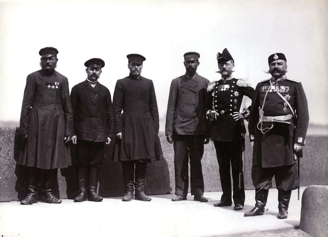 Members of the State Duma with two Russian police officers