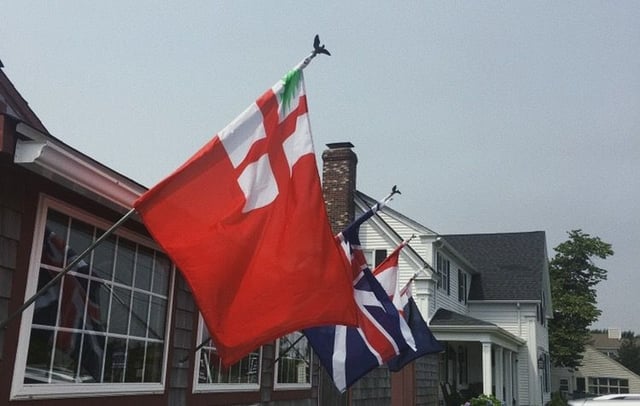 Flag of New England flying in Massachusetts. New Englanders maintain a strong sense of regional and cultural identity.