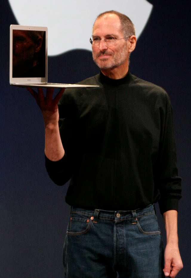 Jobs holding up a MacBook Air at the MacWorld Conference & Expo in 2008
