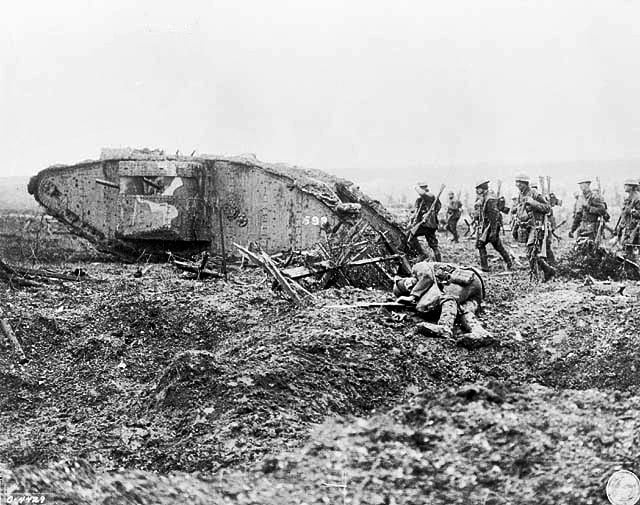 Canadian troops advancing with a British Mark II tank at the Battle of Vimy Ridge, 1917