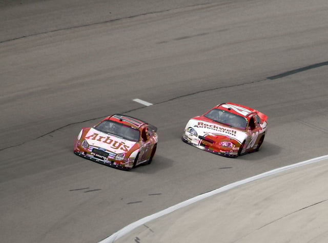 Matt Kenseth passes Denny Hamlin to win the 2007 event
