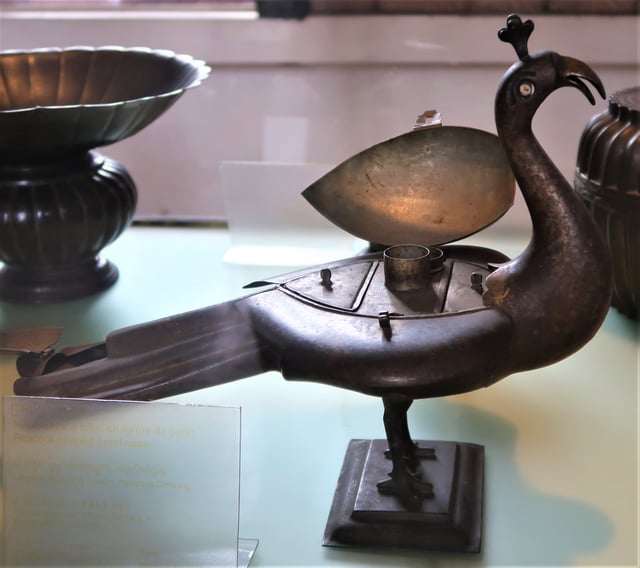 Paan dan in shape of peacock. Made of brass, the box dates to 17th or 18th century. On display at the National Museum of Cambodia.