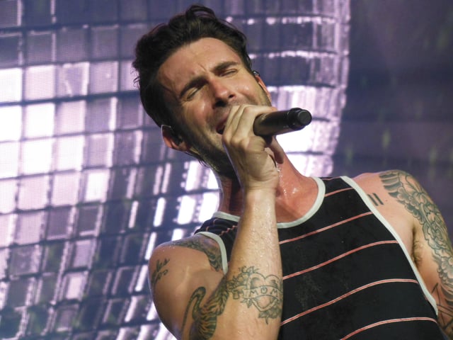 Levine performing at the opening night of the Honda Civic Tour 2013