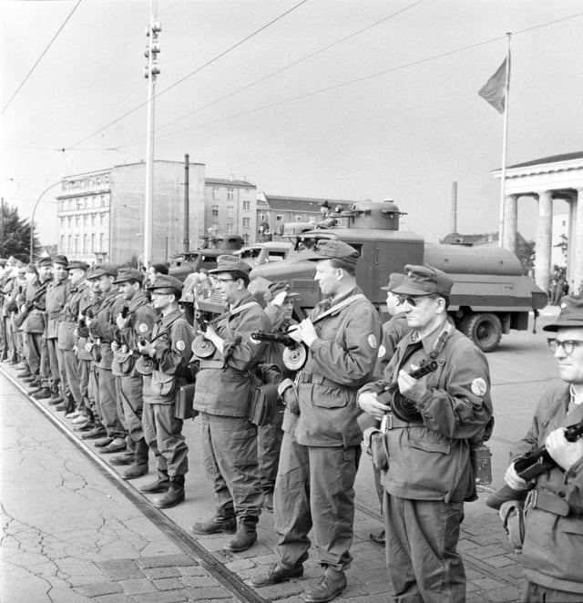 East German Combat Groups of the Working Class close the border on 13 August 1961 in preparation for the Berlin Wall construction.