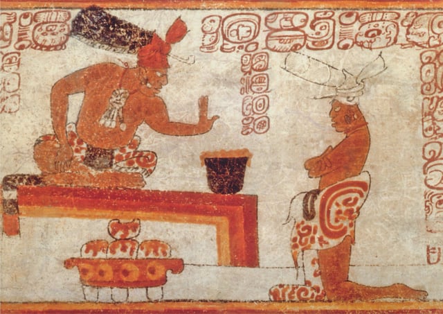 A Maya lord forbids an individual from touching a container of chocolate.