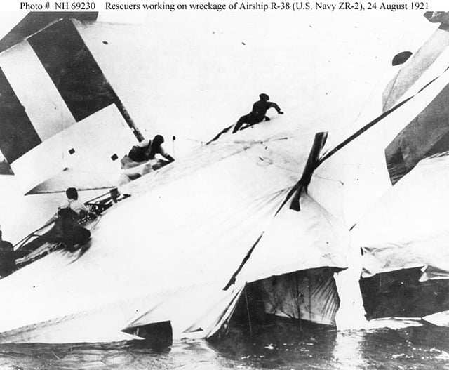 Rescuers scramble across the wreckage of British R-38/USN ZR-2, 24 August 1921.