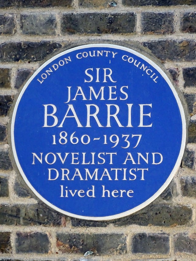 Blue plaque on 100 Bayswater Road, London where Barrie lived and wrote Peter Pan