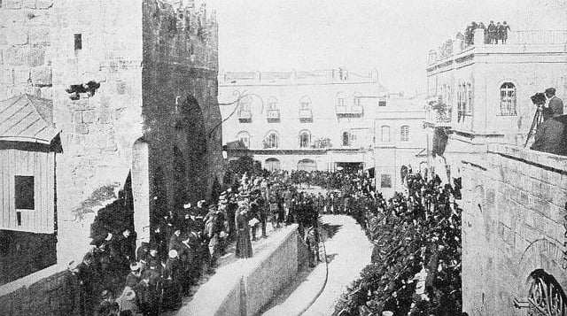 The formal transfer of Jerusalem to British rule.  A "native priest" reads the proclamation from the steps of the Tower of David.