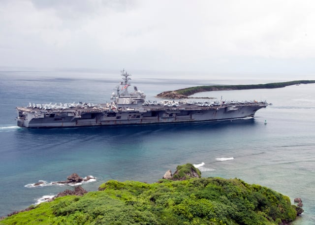 The aircraft carrier USS Ronald Reagan (CVN 76) enters Apra Harbor for a scheduled port visit