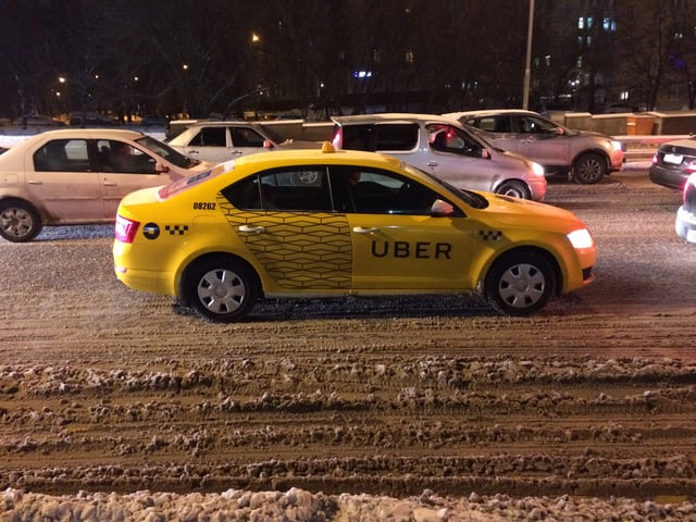 Yellow Uber car in Moscow