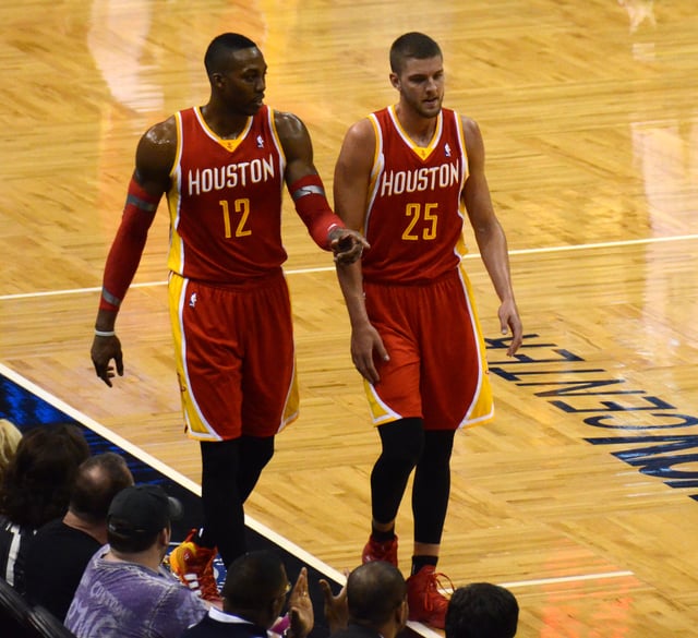 Parsons (right) with the Rockets in March 2014, alongside teammate Dwight Howard