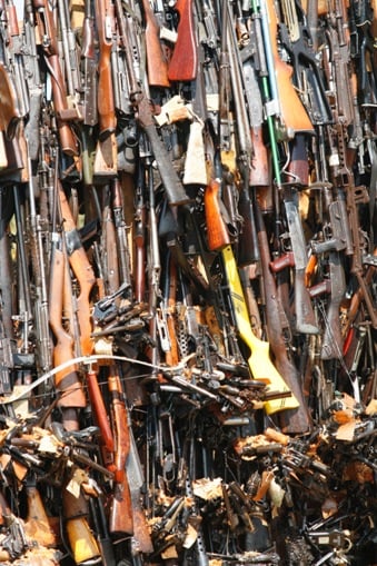 A tower of confiscated smuggled weapons about to be set ablaze in Nairobi, Kenya