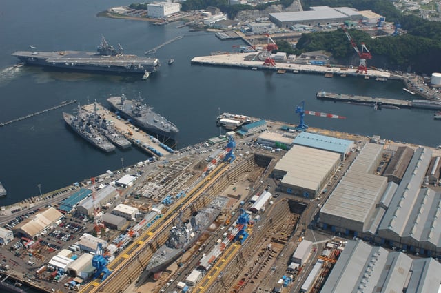 USS Kitty Hawk (CV-63) docks at the U.S. Navy base in Yokosuka, Japan