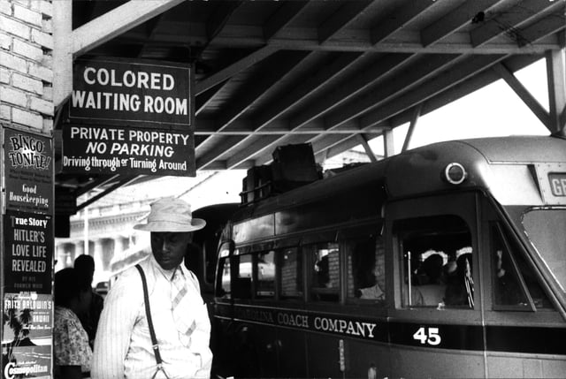 Sign for the "colored" waiting room at a bus station in Durham, North Carolina, 1940