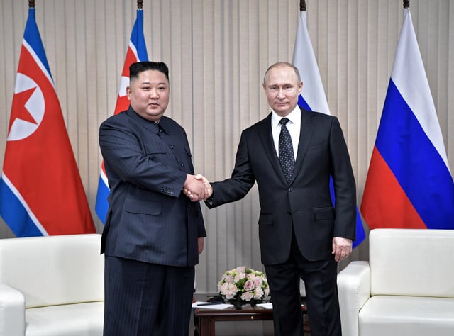 Kim and Russian President Vladimir Putin shake hands during of the North Korea–Russia Summit, April 2019